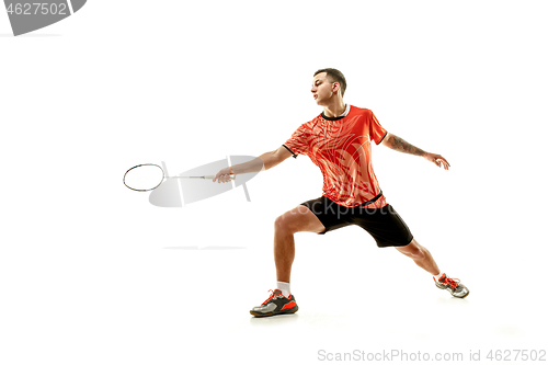 Image of Young male badminton player over white background