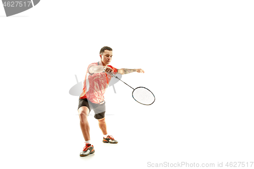 Image of Young male badminton player over white background