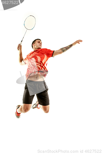 Image of Young male badminton player over white background