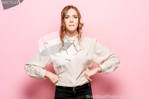 Image of Serious unhappy female has appealing appearance, being sad after quarrel