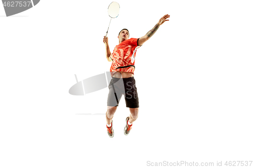 Image of Young male badminton player over white background