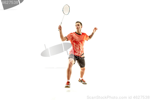 Image of Young male badminton player over white background