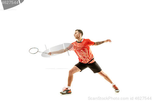 Image of Young male badminton player over white background