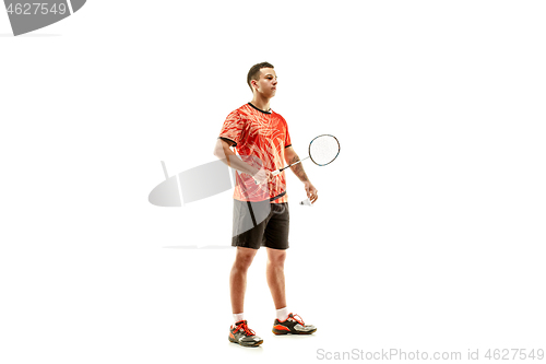 Image of Young male badminton player over white background