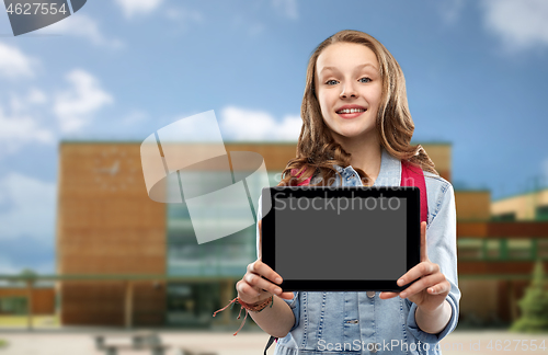Image of student girl with tablet computer over school