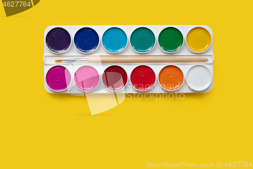 Image of watercolor package on a yellow background