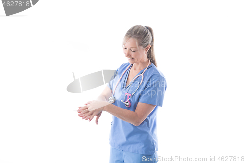 Image of Nurse demonstrating how to wash hands effectively