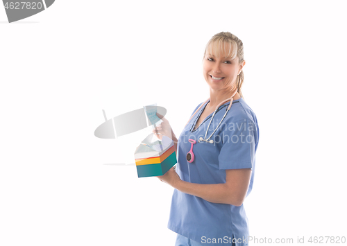 Image of Smiling nurse holding a box of surgical medical masks or much ne