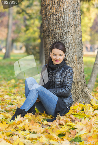 Image of Woman in a Forest in the Autumn