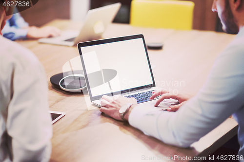Image of Startup Business Team At A Meeting at modern office building