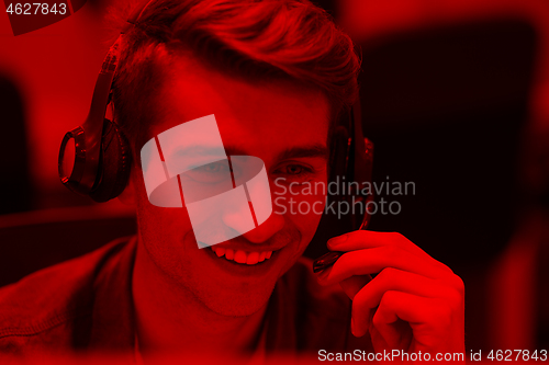 Image of male call centre operator doing his job