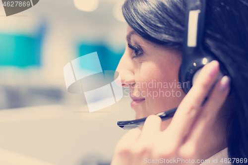 Image of female call centre operator doing her job