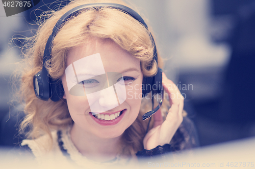 Image of female call centre operator doing her job