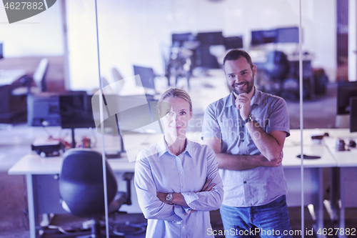 Image of business couple at office