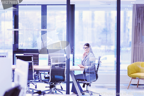 Image of Businesswoman using tablet