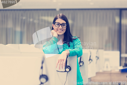 Image of female call centre operator doing her job