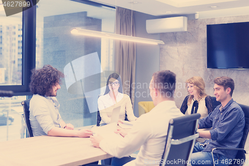 Image of Startup Business Team At A Meeting at modern office building