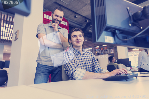 Image of startup business people group working as team to find solution