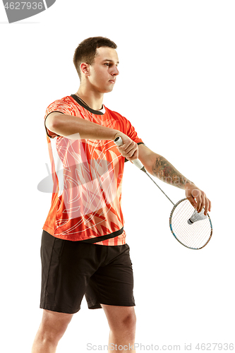 Image of Young male badminton player over white background