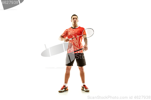 Image of Young male badminton player over white background