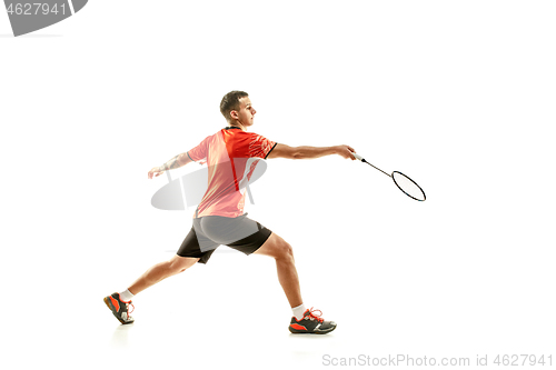 Image of Young male badminton player over white background