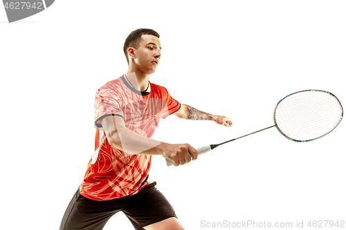 Image of Young male badminton player over white background