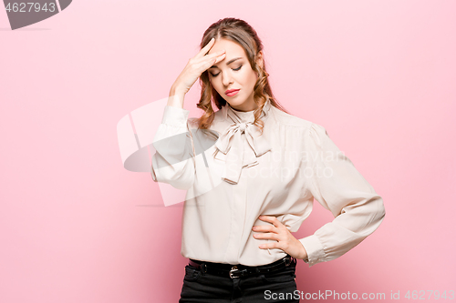 Image of Serious unhappy female has appealing appearance, being sad after quarrel