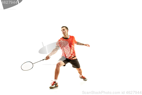 Image of Young male badminton player over white background