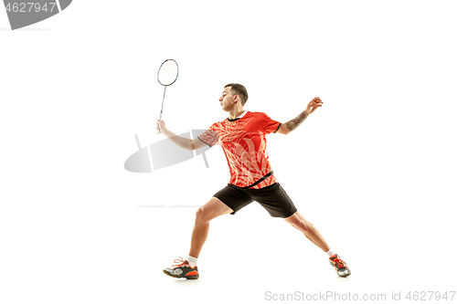 Image of Young male badminton player over white background