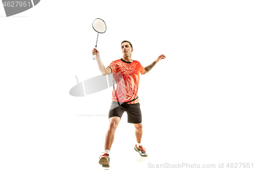 Image of Young male badminton player over white background