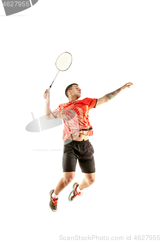 Image of Young male badminton player over white background