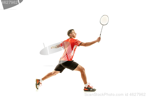 Image of Young male badminton player over white background