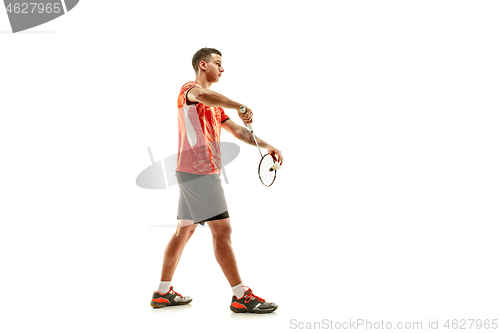 Image of Young male badminton player over white background