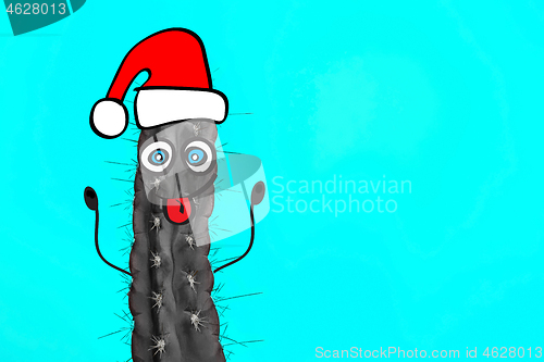 Image of Cactus hipster man with santa hat. Tropical Christmas concept. Minimal fun art