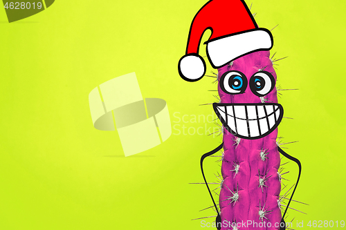 Image of Cactus hipster man with santa hat. Tropical Christmas concept. Minimal fun art