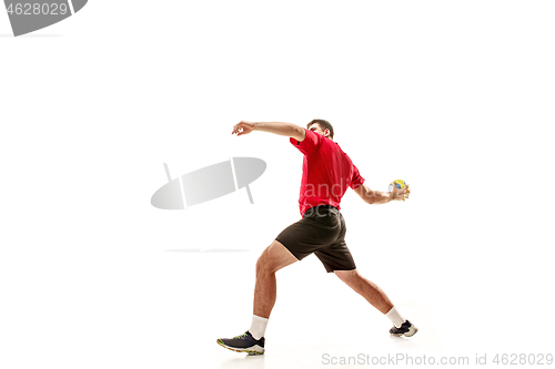 Image of The one caucasian young man as handball player at studio on white background