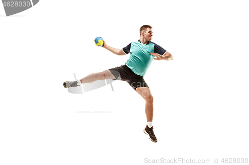 Image of The one caucasian young man as handball player at studio on white background