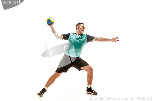 Image of The one caucasian young man as handball player at studio on white background