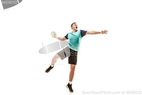 Image of The one caucasian young man as handball player at studio on white background