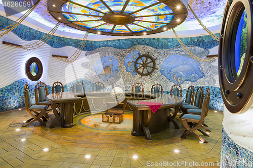 Image of Wine tasting room with round table and seats