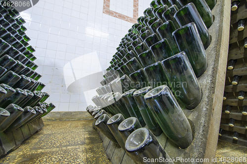 Image of Wine sparkling bottles on stands