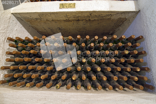 Image of Dirty wine bottle in winery