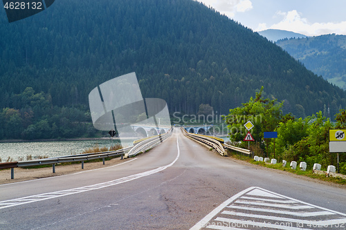 Image of Crossing bridge road on mountain valley