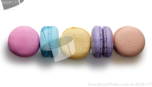 Image of Five multicolored macaroon in row