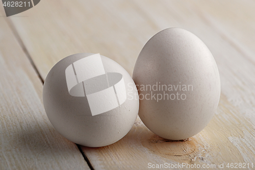 Image of White eggs on a white table