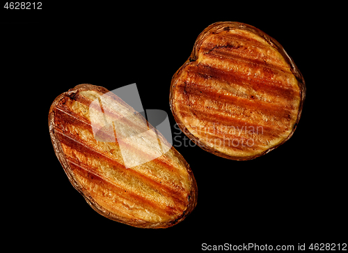 Image of Two slices of grilled potatoes