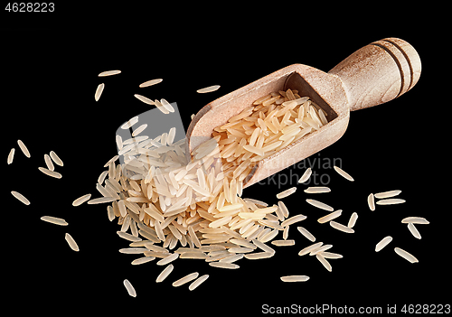 Image of Rice in a wooden scoop