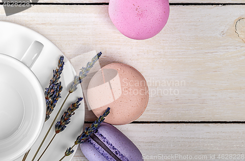 Image of Macaroons near cup and lavender closeup