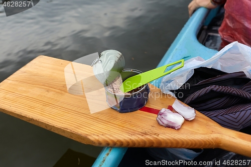 Image of Canoing trip tuna can eating