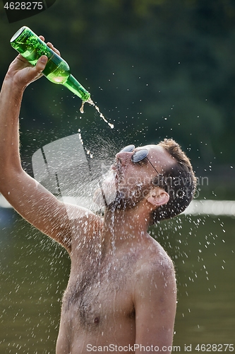 Image of Man drinking like crazy